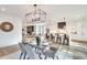 Well-designed kitchen and dining area features stainless steel appliances, seating, and access to living spaces at 625 Home Se Ave, Atlanta, GA 30312