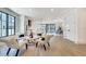Open-concept living room with hardwood floors and views of the kitchen and dining area at 625 Home Se Ave, Atlanta, GA 30312
