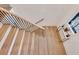 Modern staircase with wooden steps and black metal railings, leading to the upper level at 625 Home Se Ave, Atlanta, GA 30312