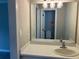Clean bathroom with a modern vanity, large mirror, and updated lighting at 870 Thornberry Dr, Alpharetta, GA 30022