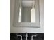 Elegant bathroom with a granite countertop, framed mirror, and a modern sink faucet at 870 Thornberry Dr, Alpharetta, GA 30022