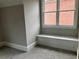 Bedroom featuring a cozy window seat with built-in storage, perfect for relaxing and reading at 870 Thornberry Dr, Alpharetta, GA 30022