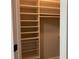 Organized walk-in closet with custom shelving and storage baskets at 870 Thornberry Dr, Alpharetta, GA 30022