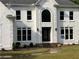 Elegant front exterior with manicured lawn and welcoming entrance at 870 Thornberry Dr, Alpharetta, GA 30022