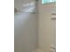 Bathroom featuring a shower with white tile and chrome shower head at 870 Thornberry Dr, Alpharetta, GA 30022