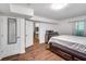Comfortable bedroom with hardwood floors and ample natural light at 1029 Megan Ct, Sugar Hill, GA 30518