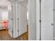 Hallway view of folding doors that provides seamless transitions between rooms at 1029 Megan Ct, Sugar Hill, GA 30518