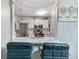 A kitchen view with eat-in countertop, updated cabinets, and stainless appliances at 1029 Megan Ct, Sugar Hill, GA 30518