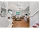 Bright living room features hardwood floors, a fireplace, and comfortable couches at 1029 Megan Ct, Sugar Hill, GA 30518