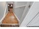 Staircase leads down to a cozy living area at 1029 Megan Ct, Sugar Hill, GA 30518