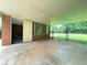 Covered back porch ready for outdoor entertaining and relaxation at 2988 Ramble Ln, Decatur, GA 30033