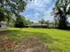 Expansive backyard view of the home, featuring lots of room for recreation at 2988 Ramble Ln, Decatur, GA 30033