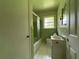 Bathroom with shower and classic tile, offers a functional space at 2988 Ramble Ln, Decatur, GA 30033