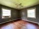 Bedroom featuring natural light and wood floors; perfect for a makeover at 2988 Ramble Ln, Decatur, GA 30033
