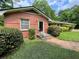 Charming single-story brick home with well-kept front yard landscaping at 2988 Ramble Ln, Decatur, GA 30033