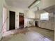 A kitchen with white cabinets awaiting transformation, offering a chance to customize at 2988 Ramble Ln, Decatur, GA 30033
