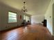 Spacious living room featuring hardwood floors and a chandelier at 2988 Ramble Ln, Decatur, GA 30033