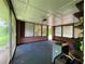 Enclosed patio with lots of natural light; perfect for relaxing and enjoying the outdoors at 2988 Ramble Ln, Decatur, GA 30033