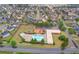 Aerial view showcasing the community pool, playground, and surrounding neighborhood at 59 Summer Nw Pl, Cartersville, GA 30121