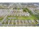 Neighborhood aerial view shows homes backing to green space and a pond in a peaceful and well-planned community layout at 59 Summer Nw Pl, Cartersville, GA 30121
