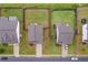Aerial view of homes showcasing well-maintained lawns, fenced backyards, and neighborhood streets at 59 Summer Nw Pl, Cartersville, GA 30121