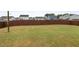 Large, green fenced in backyard perfect for outdoor activities and relaxation at 59 Summer Nw Pl, Cartersville, GA 30121