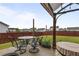 Relaxing outdoor patio with outdoor seating perfect for gatherings with a grassy fenced backyard at 59 Summer Nw Pl, Cartersville, GA 30121