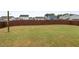 Sprawling fenced backyard featuring well-maintained grass with great sun exposure at 59 Summer Nw Pl, Cartersville, GA 30121