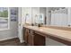 Bathroom with single sink vanity, updated fixtures, and tiled shower with glass door at 59 Summer Nw Pl, Cartersville, GA 30121