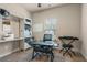 Bright bedroom featuring a sewing station, keyboard and attached storage shelves at 59 Summer Nw Pl, Cartersville, GA 30121