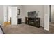Bedroom featuring fireplace, tv, and ensuite bathroom with luxury vinyl plank flooring at 59 Summer Nw Pl, Cartersville, GA 30121