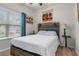 Bright bedroom with a window and decorative headboard at 59 Summer Nw Pl, Cartersville, GA 30121