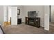 Cozy bedroom with an entertainment center, providing a comfortable and relaxing atmosphere at 59 Summer Nw Pl, Cartersville, GA 30121