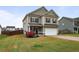 Charming two-story home with manicured lawn and inviting curb appeal in a Gathering-friendly neighborhood at 59 Summer Nw Pl, Cartersville, GA 30121