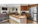Open concept kitchen with stainless steel appliances, granite countertops and a large center island at 59 Summer Nw Pl, Cartersville, GA 30121