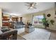 Open living space connected to the kitchen, featuring a comfortable sofa and stylish decor at 59 Summer Nw Pl, Cartersville, GA 30121