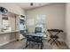Cozy home office featuring a glass desk, comfortable chair, and natural light, perfect for remote work or study at 59 Summer Nw Pl, Cartersville, GA 30121