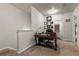 Cozy and private office space with a dark wood desk with rolling chair and built-in shelving at 59 Summer Nw Pl, Cartersville, GA 30121