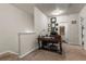Upstairs office space featuring traditional wood desk and chair plus neutral carpet at 59 Summer Nw Pl, Cartersville, GA 30121