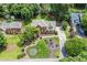 Lovely two-story brick home with a well-manicured lawn and beautiful landscaping at 1885 Vintage Dr, Snellville, GA 30078