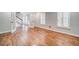 Bright open living space with hardwood floors and staircase to upstairs at 1885 Vintage Dr, Snellville, GA 30078