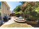 Backyard patio with outdoor seating area and water feature at 2103 Drogheda Ln, Marietta, GA 30066