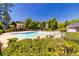 Community pool with deck, surrounded by mature landscaping at 2103 Drogheda Ln, Marietta, GA 30066