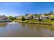 Community pond view with fountain and manicured surroundings at 2103 Drogheda Ln, Marietta, GA 30066
