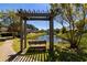 Bench swing overlooking a pond with fountain at 2103 Drogheda Ln, Marietta, GA 30066