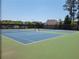 Well-maintained blue and green tennis courts offer a fantastic recreational amenity for active residents at 2103 Drogheda Ln, Marietta, GA 30066