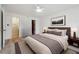 Bright staged bedroom featuring decor and ceiling fan at 3980 Riverlook Se Pkwy # 203, Marietta, GA 30067