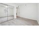 Staged bedroom featuring large mirrored closet and ceiling fan at 3980 Riverlook Se Pkwy # 203, Marietta, GA 30067