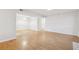 Spacious living room with laminate flooring and easy access to other rooms at 3980 Riverlook Se Pkwy # 203, Marietta, GA 30067