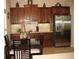Kitchen with cherry wood cabinets, granite countertops, and stainless steel appliances and breakfast area at 1213 Dawnview Dr, Locust Grove, GA 30248